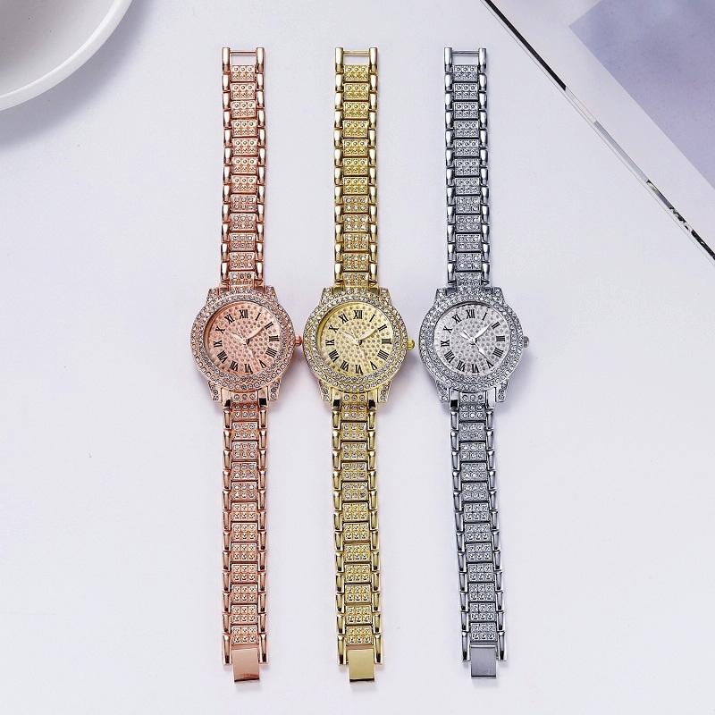 Veile Studios Gold Alloy Steel Strap Quartz Wristwatch With Full Diamond Roman Numerals Bracelet