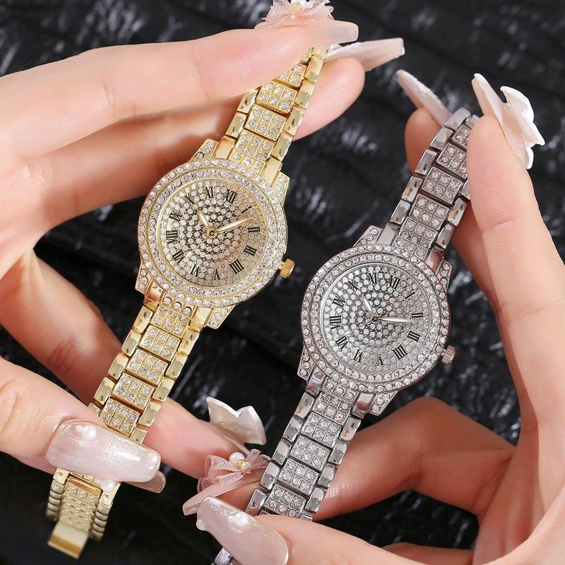 Veile Studios Gold Alloy Steel Strap Quartz Wristwatch With Full Diamond Roman Numerals Bracelet