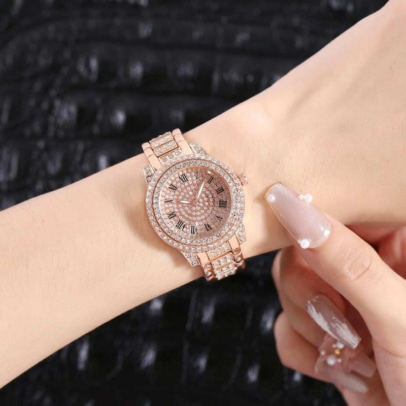 Veile Studios Gold Alloy Steel Strap Quartz Wristwatch With Full Diamond Roman Numerals Bracelet