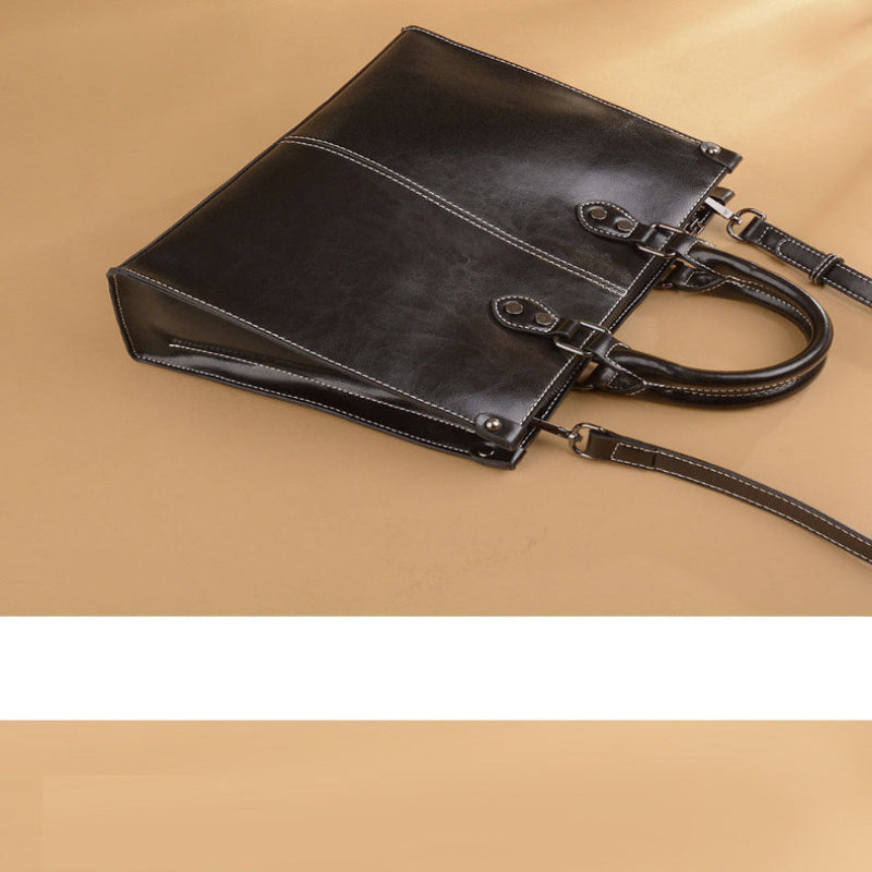 Brown Elegant Leather Handbag Stylish Tote With Adjustable Strap